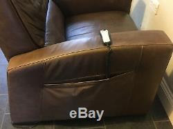 Natuzzi brown leather electric reclining armchair with remote control
