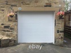 White Single Aluminium Insulated Electric Roller Garage door made in UK to size